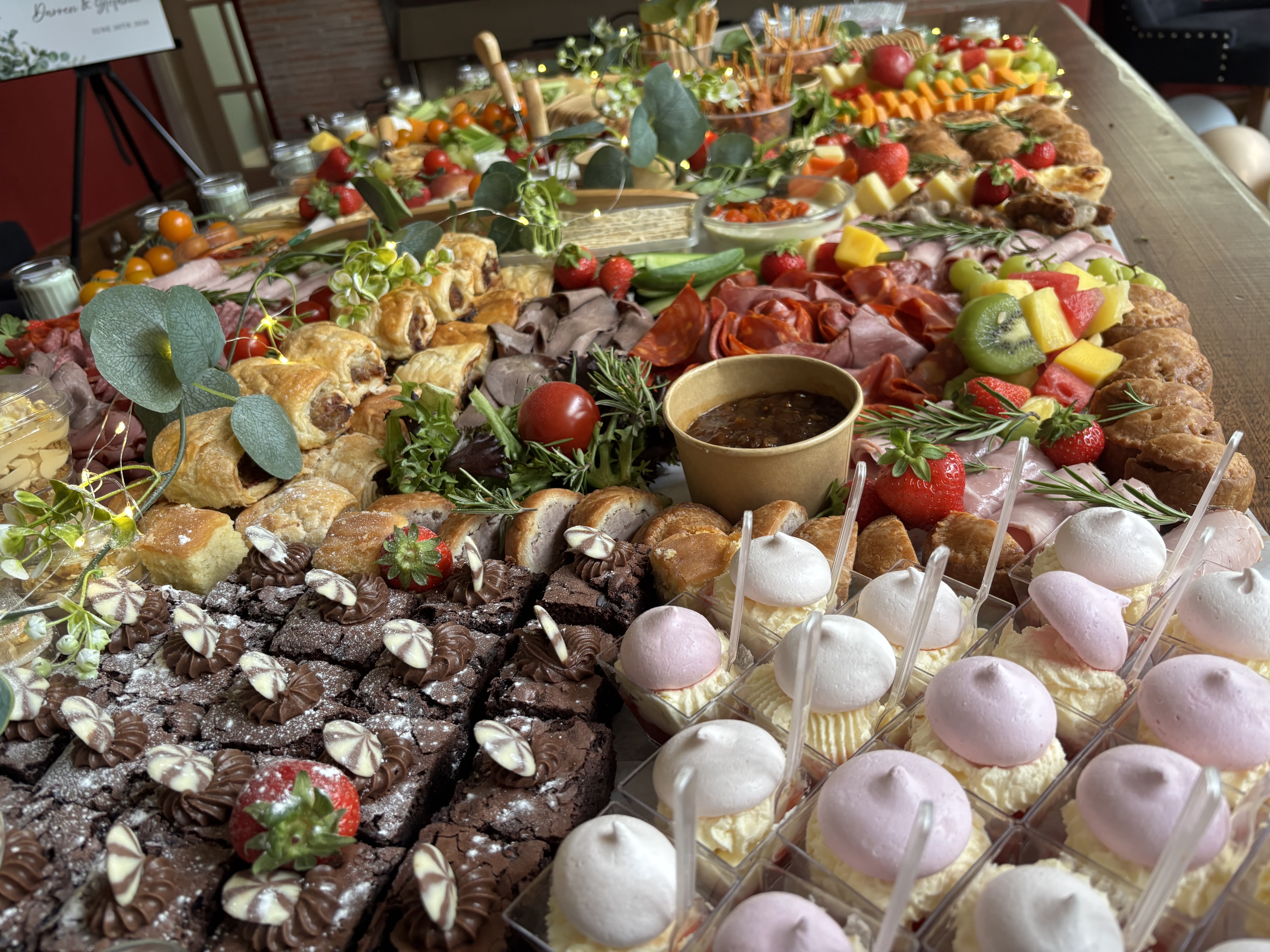 Wedding nibbles grazing table with handmade mini desserts